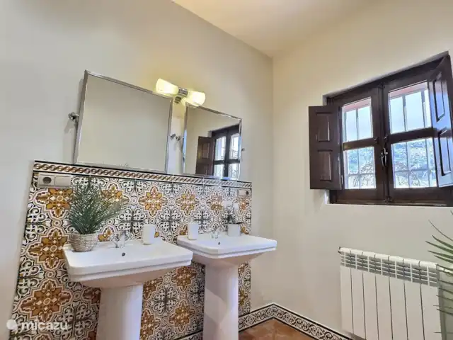 De badkamer van een van onze standaard slaapkamers.